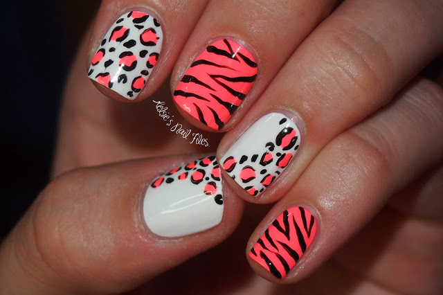 10. Chic and Playful Animal Print Nail Art Designs - wide 2