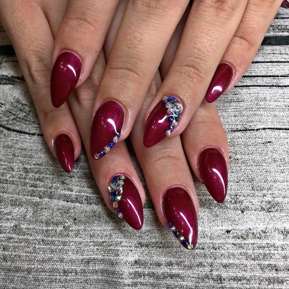dark red nails with gems