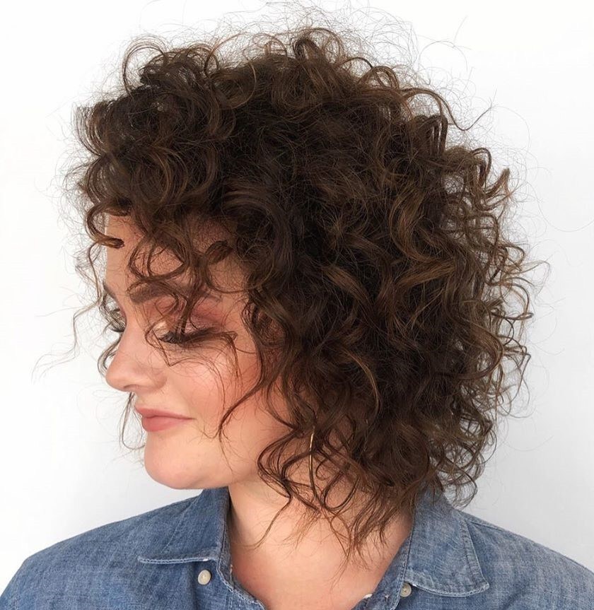Mid-Length Haircut for Women with Curly Hair