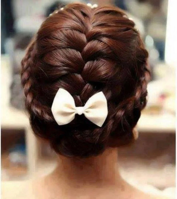 17 Disney Princess Hairstyles - A gorgeous braided updo.